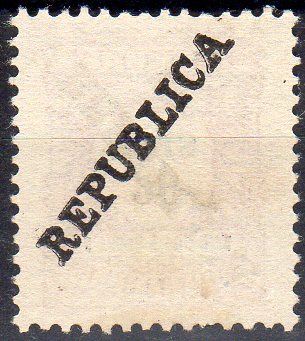 1085 v.jpg -     Lote:    1085 (verso)                   Descrição:         1913 &mdash; Porteado. Emissão regular. Valor em reis, com sobrecarga REPUBLICA local zincogravada. CE POR33, 20 reis. Selo com dupla sobrecarga na frente e também no verso.        *       Valor Base:     &euro; 10,00     Valor Venda:     &euro;      
